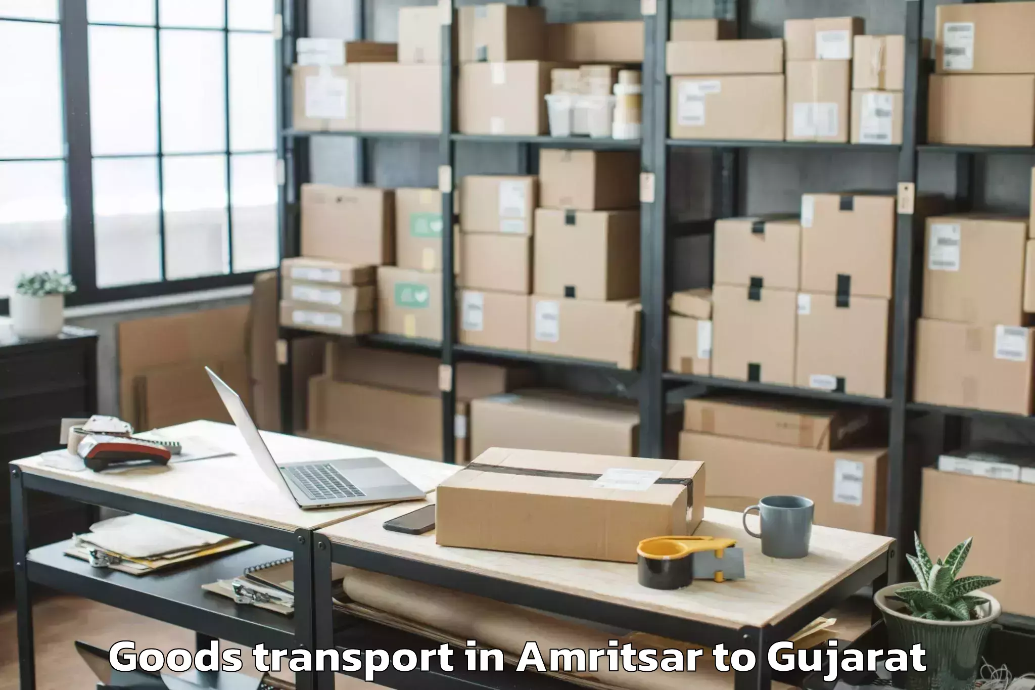 Book Your Amritsar to Malpur Goods Transport Today